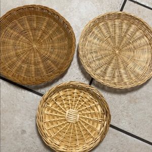 Set of three shallow woven trays